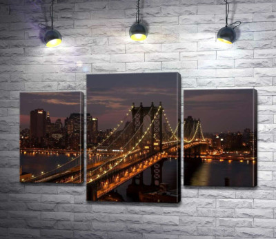 Вогні Бруклінського мосту (The Brooklyn Bridge) освічують нічну дорогу