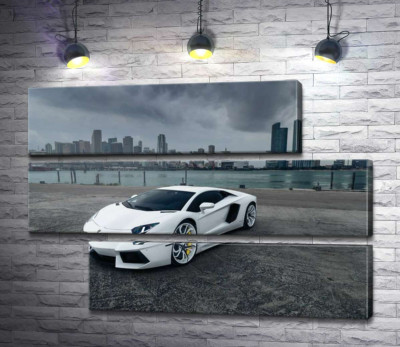 Модульна картина "Білосніжний автомобіль Ламборгіні (Lamborghini) на фоні передгрозового мегаполісу"