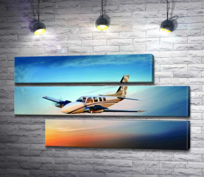 Модульна картина "Американський літак Beechcraft Bonanza серед палаючого заходу"