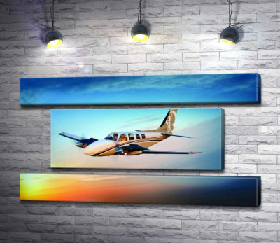 Модульна картина "Американський літак Beechcraft Bonanza серед палаючого заходу"