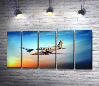 Модульна картина "Американський літак Beechcraft Bonanza серед палаючого заходу"