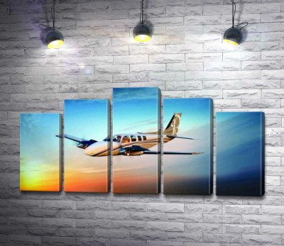 Модульна картина "Американський літак Beechcraft Bonanza серед палаючого заходу"