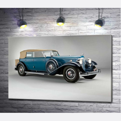 Синий автомобиль с откидным верхом 1932 года Packard Twin Six