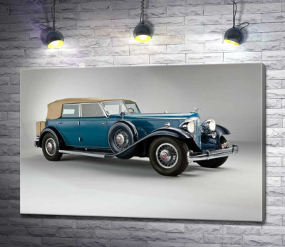 Синий автомобиль с откидным верхом 1932 года Packard Twin Six