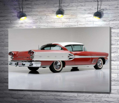 Вишнево-білий автомобіль Pontiac Bonneville 1958 року