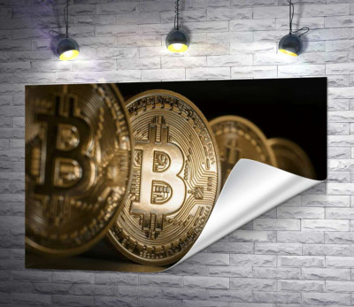 Переливы золотого на монетах биткоинов