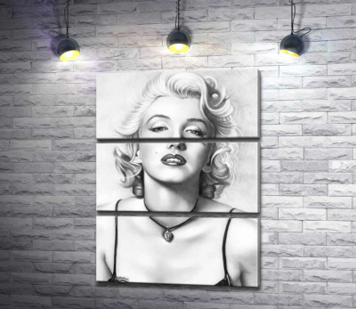 Видатна актриса Мерілін Монро (Marilyn Monroe) з тендітним кулоном на шиї