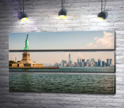 Статуя Свободи (Statue of Liberty) височіє над водами затоки