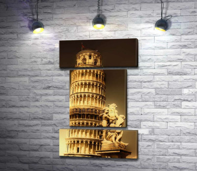 Пізанська вежа (Pisa tower) видніється через фонтан Путті (Fontana dei Putti)