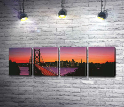 Міст Бей-Брідж (Bay Bridge) веде до вечірнього Сан-Франциско 