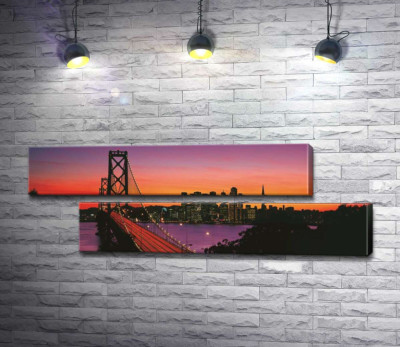 Міст Бей-Брідж (Bay Bridge) веде до вечірнього Сан-Франциско 
