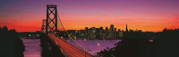 Мост Бэй-Бридж (Bay Bridge) ведет к вечернему Сан-Франциско