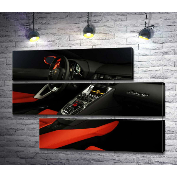 Изысканный салон автомобиля Ламборгини (Lamborghini) в красно-черных тонах