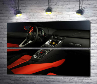 Изысканный салон автомобиля Ламборгини (Lamborghini) в красно-черных тонах