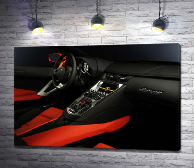 Изысканный салон автомобиля Ламборгини (Lamborghini) в красно-черных тонах