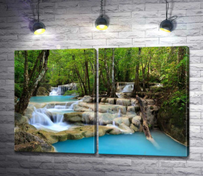 Бирюза воды плавно льется по скалистым ступеням водопада Эраван (Erawan falls)