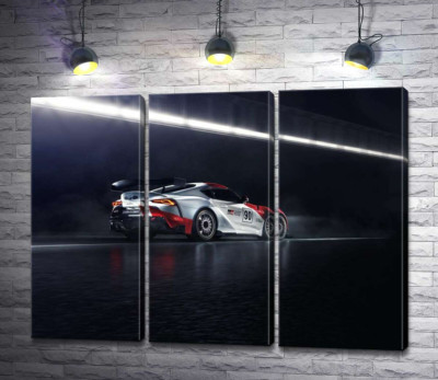 Модульна картина "Гоночний автомобіль Тойота (Toyota GR Supra GT4) розганяється на трасі"