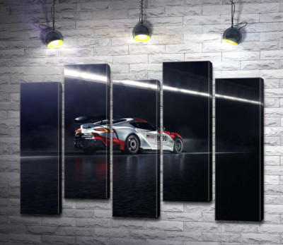 Модульна картина "Гоночний автомобіль Тойота (Toyota GR Supra GT4) розганяється на трасі"
