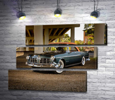 Модульна картина "Темний автомобіль кабріолет Chrysler 1955 стоїть в тіні мосту"