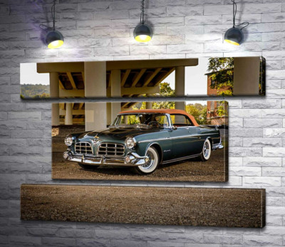 Модульная картина "Темный автомобиль кабриолет Chrysler 1955 стоит в тени моста"