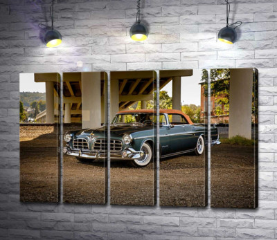 Модульная картина "Темный автомобиль кабриолет Chrysler 1955 стоит в тени моста"