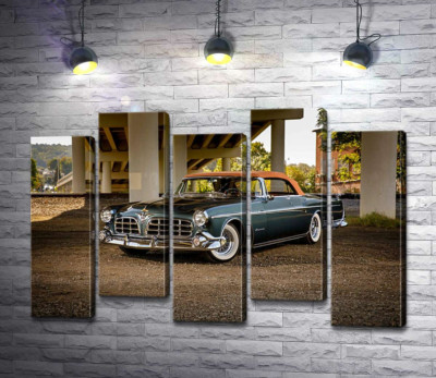 Модульная картина "Темный автомобиль кабриолет Chrysler 1955 стоит в тени моста"