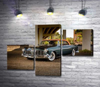 Модульная картина "Темный автомобиль кабриолет Chrysler 1955 стоит в тени моста"