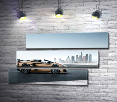 Золотий автомобіль Ламборгіні (Lamborghini Aventador) із чорними елементами