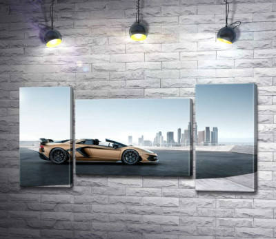 Золотий автомобіль Ламборгіні (Lamborghini Aventador) із чорними елементами