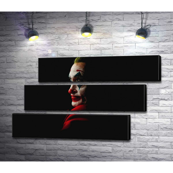 Профиль Джокера (Joker) рассеивается в тени