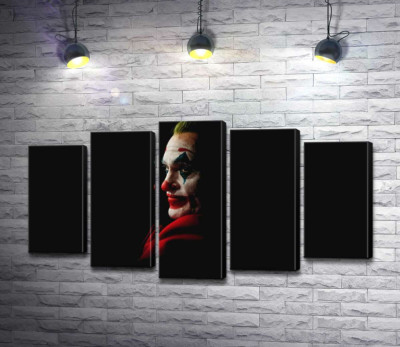 Профіль Джокера (Joker) розсіюється в тіні 