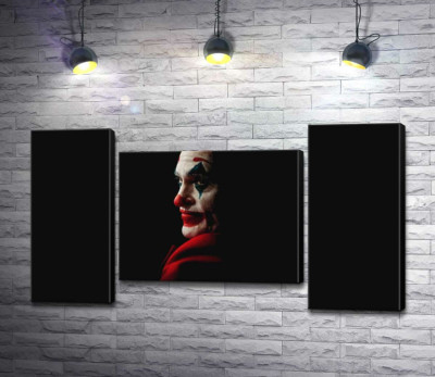 Профіль Джокера (Joker) розсіюється в тіні 