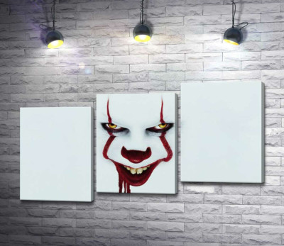 Жахаюча посмішка клоуна-вбивці Пеннівайза (Pennywise) - героя фільму жахів "Воно" (It)