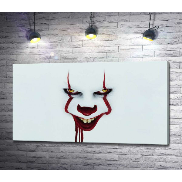 Ужасающая улыбка клоуна-убийцы Пеннивайза (Pennywise) – героя фильма ужасов "Оно" (It)