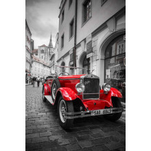 Красная яркость ретро-автомобиля Praga Alfa на улицах Праги