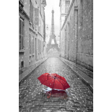 Самотній зонт на бруківці дощового Парижу