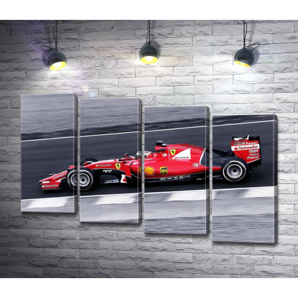 Червоний автомобіль Ferrari на гоночній трасі "Формули-1"