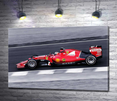 Червоний автомобіль Ferrari на гоночній трасі "Формули-1"
