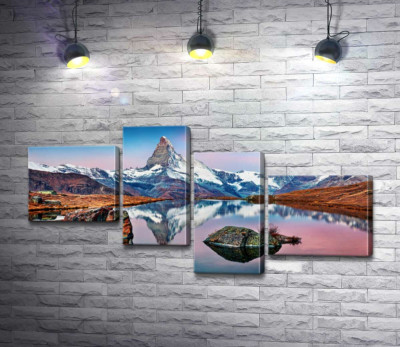 Гористий пік гори Матергорн (Matterhorn) відбивається у тихих водах озера