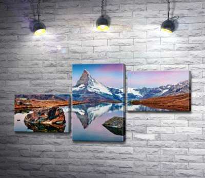 Гористий пік гори Матергорн (Matterhorn) відбивається у тихих водах озера