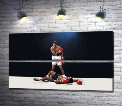 Победитель боксер Мухаммед Али (Muhammad Ali) стоит над побежденным Сонни Листоном (Sonny Liston)