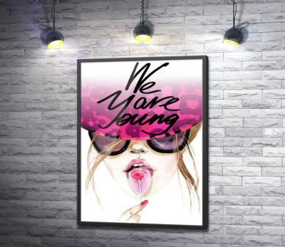 Постер "Дівчина з льодяником в рожевій шляпі з написом "we are young""