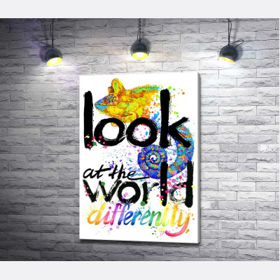 Напис "look at the world differently" з силуетом хамелеона