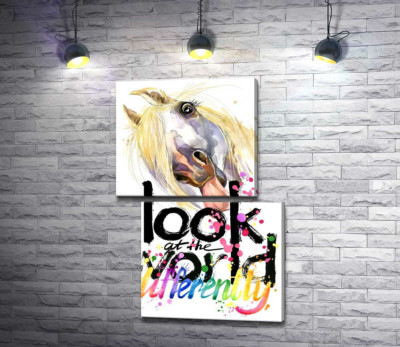 Напис "look at the world differently" та білий кінь, що показує язик