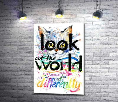 Желтые глаза кота выглядывают из-за надписи "look at the world differently"