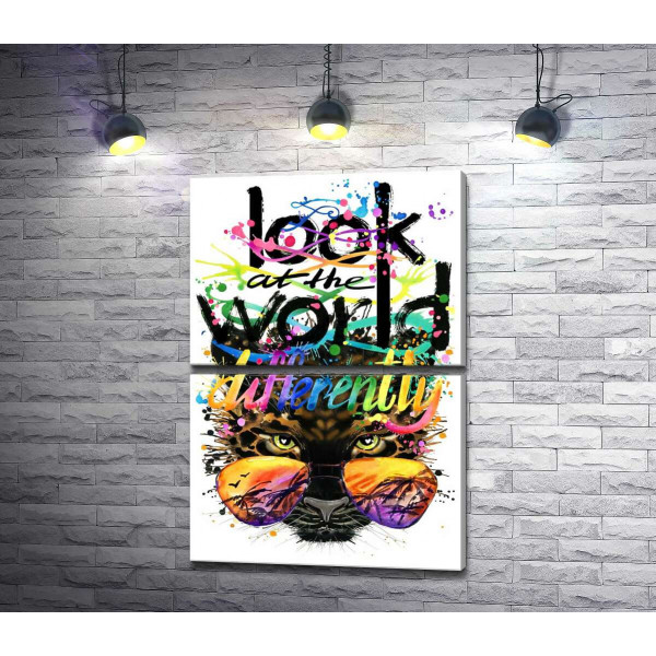 Надпись "look at the world differently" на фоне леопарда в очках