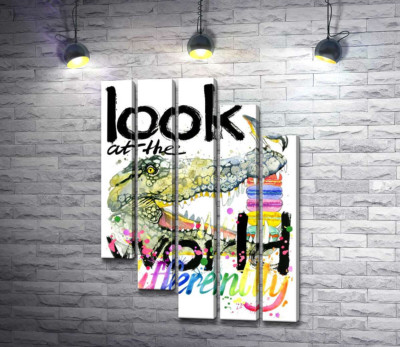 Крокодил поглинає макарони за написом "look at the world differently"