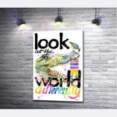 Крокодил поглинає макарони за написом "look at the world differently"