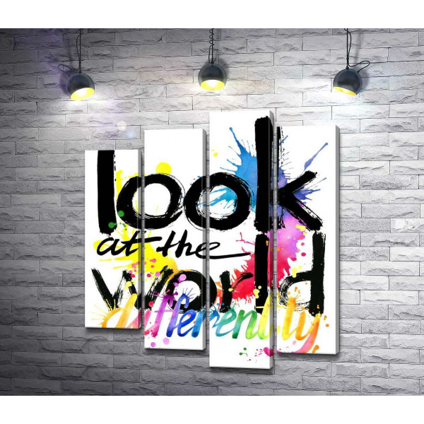 Напис "look at the world differently" на фоні кольорових плям фарби