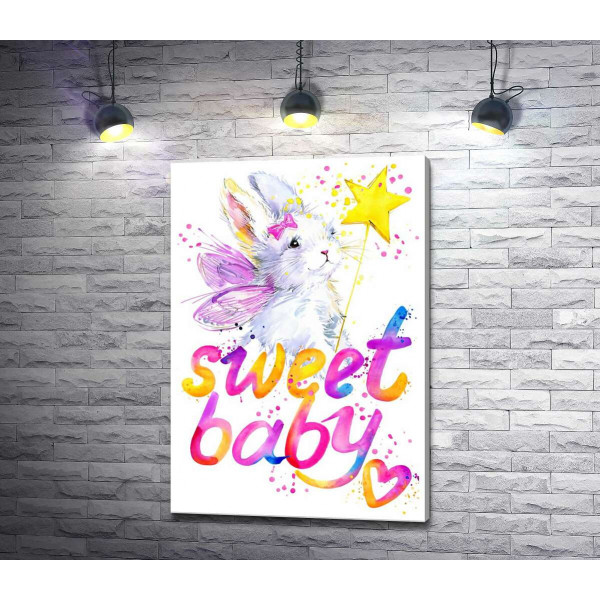 Чарівний заєць з рожевими крилами над написом "sweet baby"